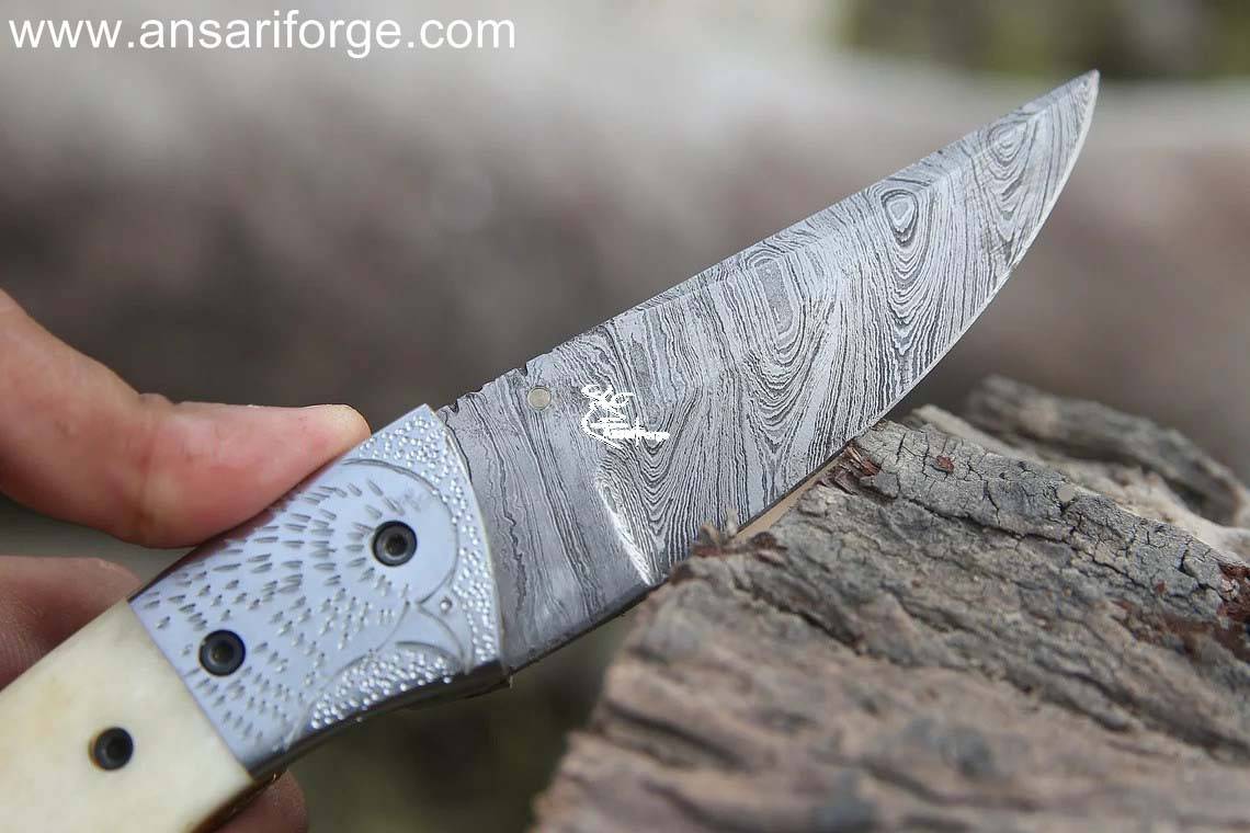 Sharp Eagle Damascus Pocket Knife Blade: Sharply forged 1095 & 15N20 Damascus steel with distinct layered pattern.