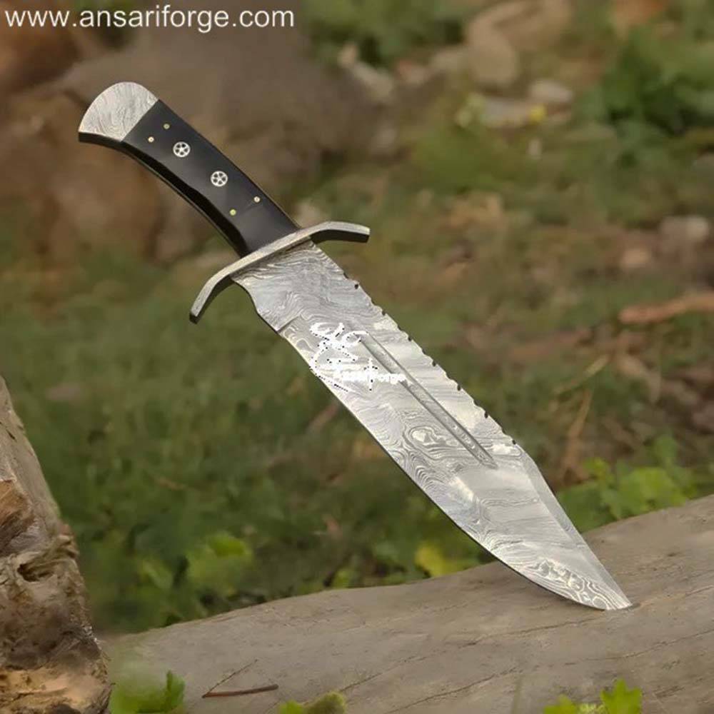 The Wanderer Damascus Bowie Knife: Hand-forged Damascus steel blade with a buffalo horn handle.