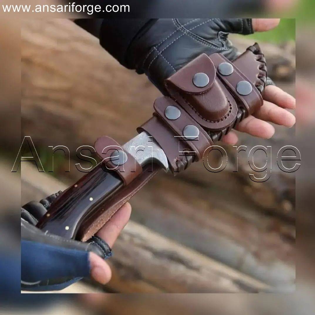 Damascus Steel Hunting Knife in a leather sheath for secure carry.