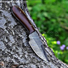Hand-forged Damascus steel blade with unique pattern on Urban EDC Knife