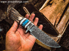 Rime Damascus Steel Antler Handle Knife Held in Hand, Ready for Adventure