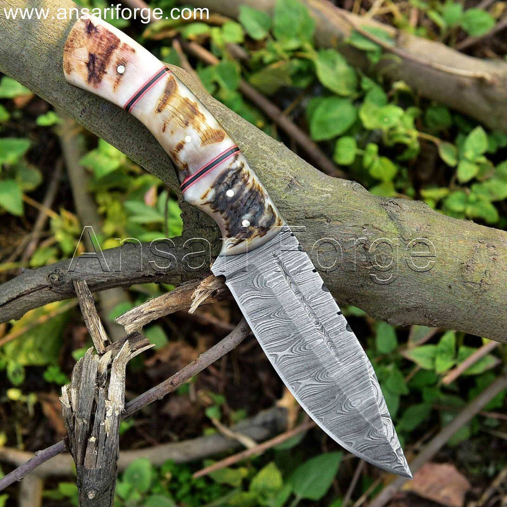 Beautiful Handmade Damascus Hunting Knife with Ram Horn Handle. Twist pattern Damascus steel blade for strength and beauty. Includes protective cowhide leather sheath.