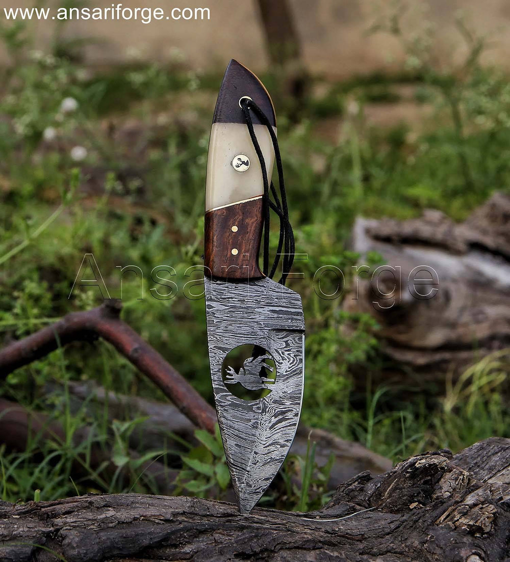 Hunter's Edge Damascus Skinning Knife - Overall view showcasing the 8.5 inch length, perfect for controlled skinning.