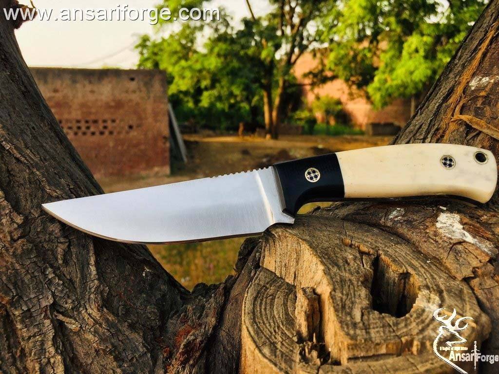 Custom handmade forged 420J2 tool steel hunting knife 420 J2 steel full tang drop point blade with 54 HRC hardness , Micarta bolsters and camel bone handle  Comes with genuine cowhide leather sheath 