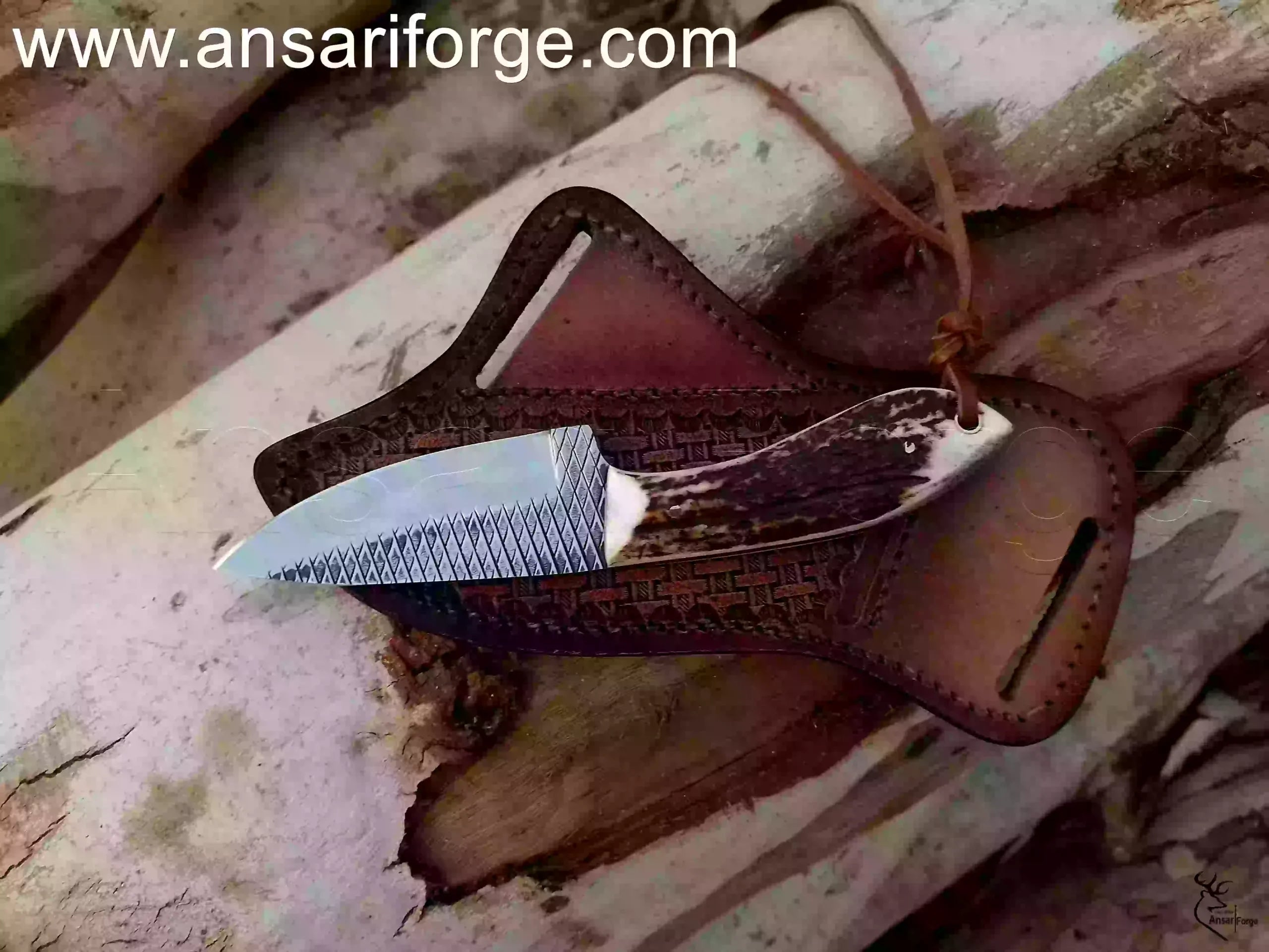 hand-forged Cowboy Knife with Sambar Stag handle and cowhide pancake sheath.