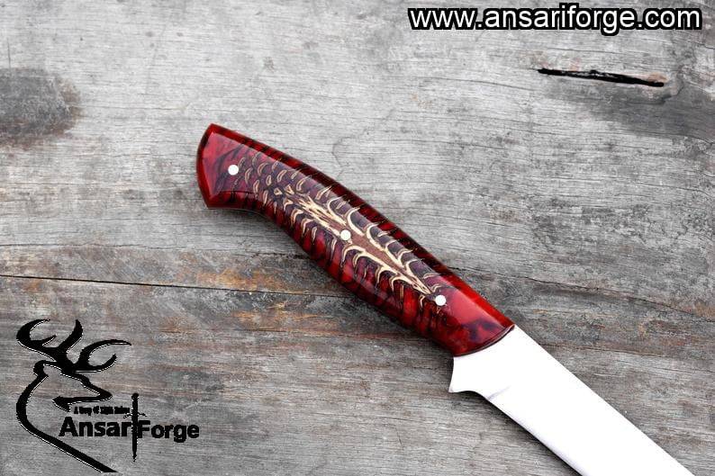 Pine cone handle of great fillet knife. red colour.