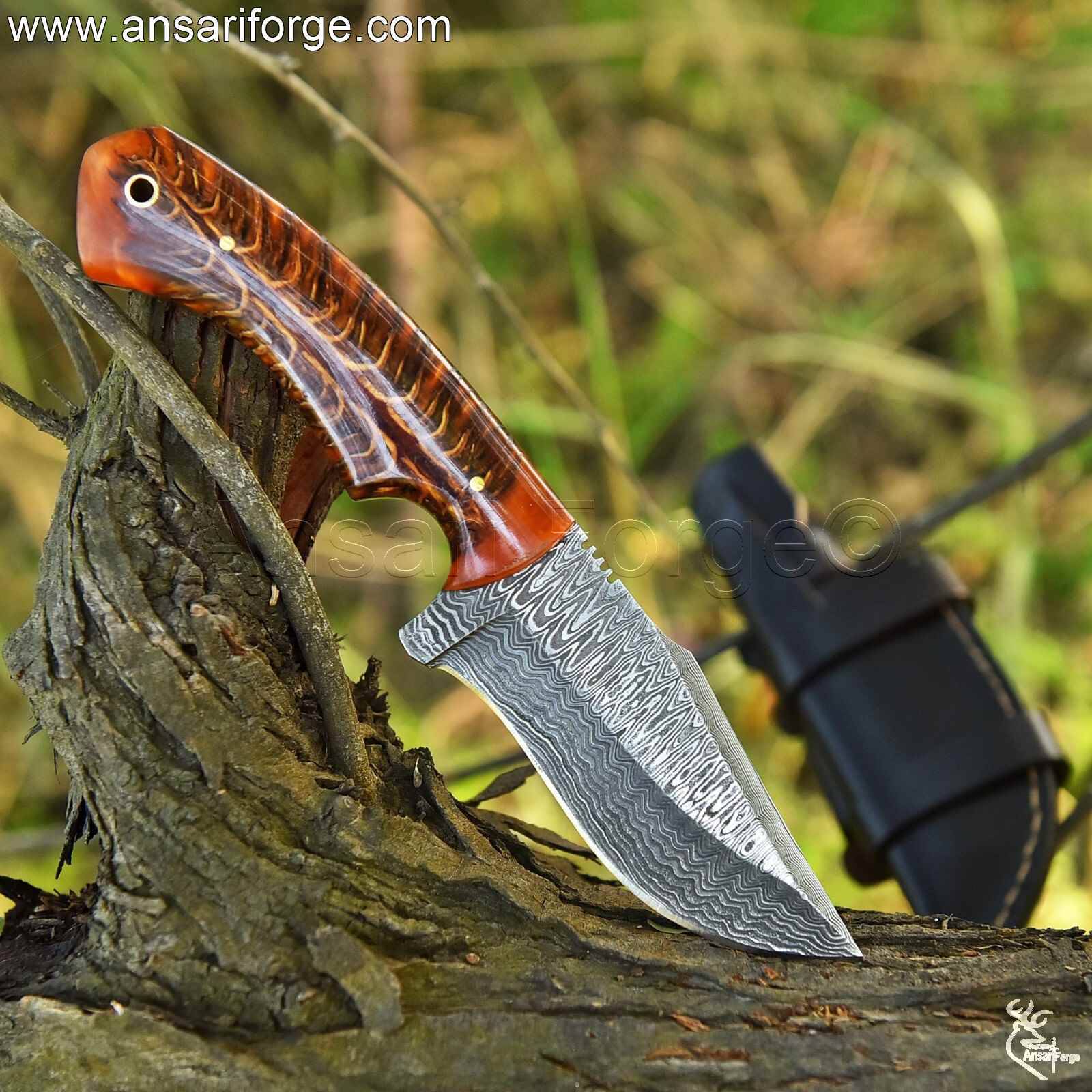 Best Anniversary Gifts for Him - Damascus Knife in Action During Camping or Survival.