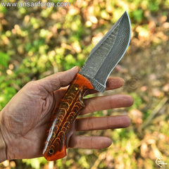 Close-Up of Ladder Pattern Damascus Blade - Razor-Sharp 60 HRC Knife for Outdoor Use.