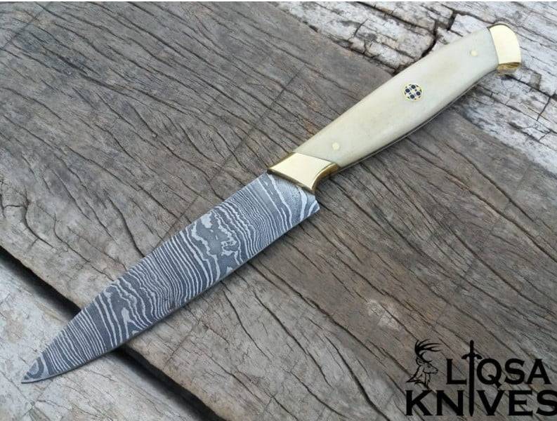A captivating image of a Custom Damascus Chefs Knife showcasing its intricate Damascus pattern and elegant design.
