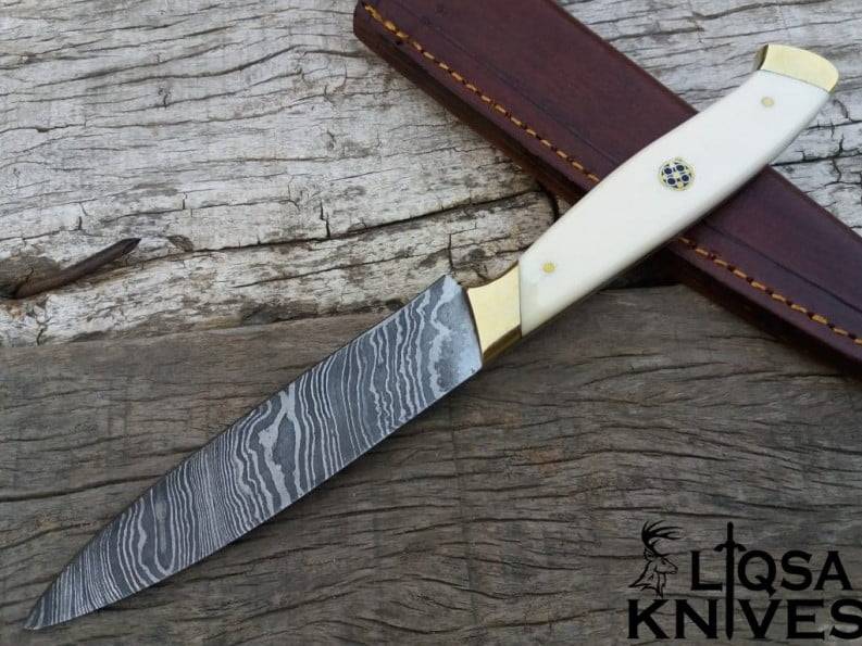 A Handmade Damascus Chefs Knife by Ansari Forge.