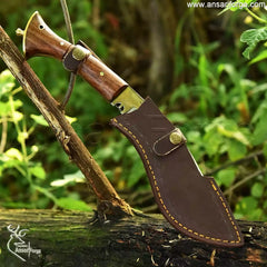 Genuine leather sheath holding the Gurkha military small kukri knife for carrying.