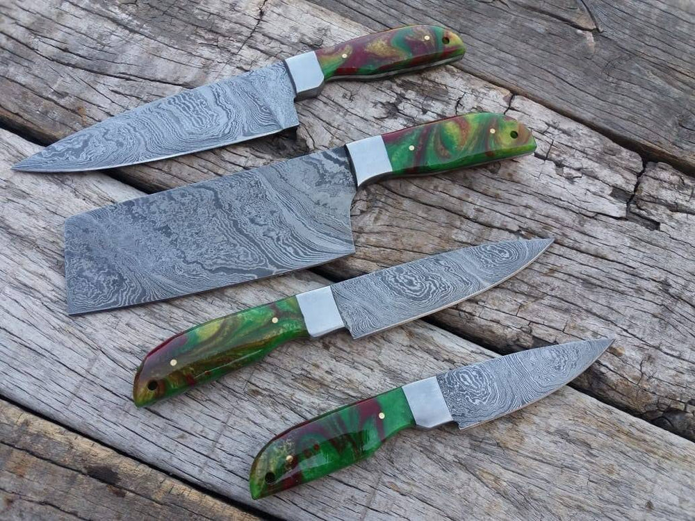 Ansari Forge Damascus Chef Knife Set with roll bag, showcasing a collection of high-quality kitchen knives with a beautiful Damascus steel pattern.