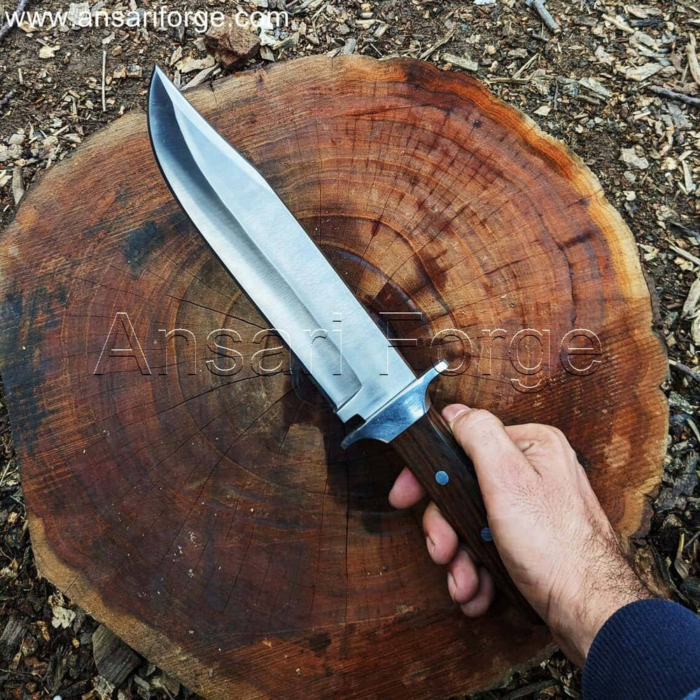 Red Dead Redemption 2 Bowie Knife being used to chop firewood on a campsite, sparks flying from the blade.