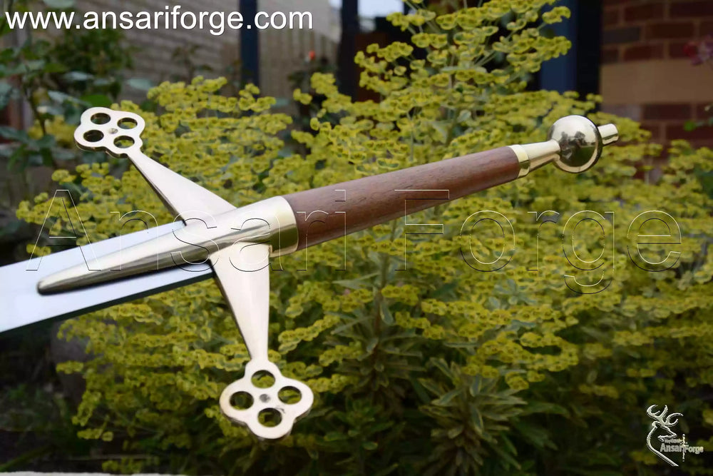 brass hilt and pommel of Scottish claymore sword.