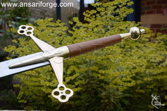 brass hilt and pommel of Scottish claymore sword.