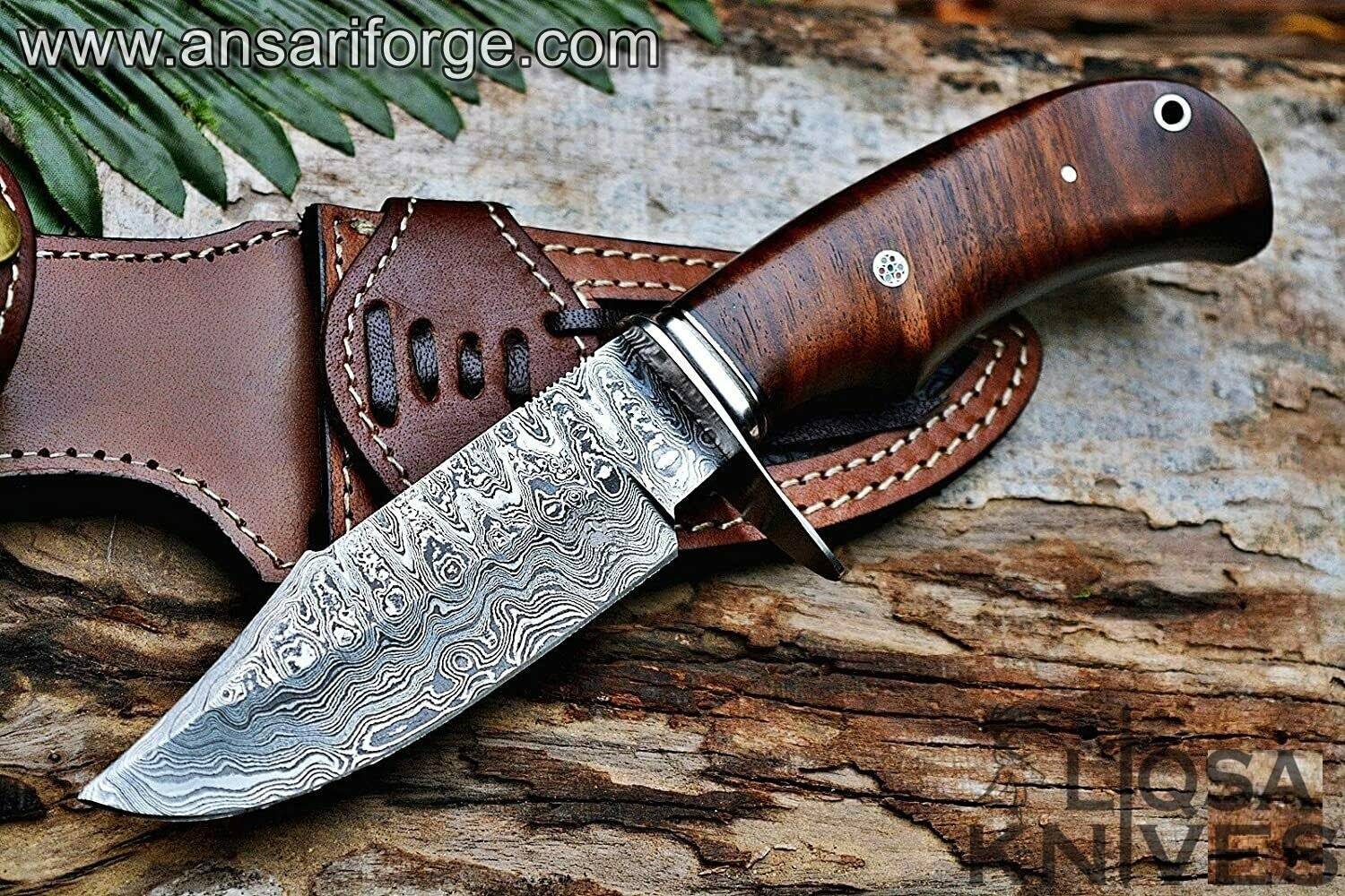 Custom made Damascus hunting knife, ladder pattern drop point blade and leather sheath.