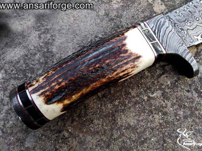 Stag antler handle & Damascus guard of Damascus steel hunting knife.