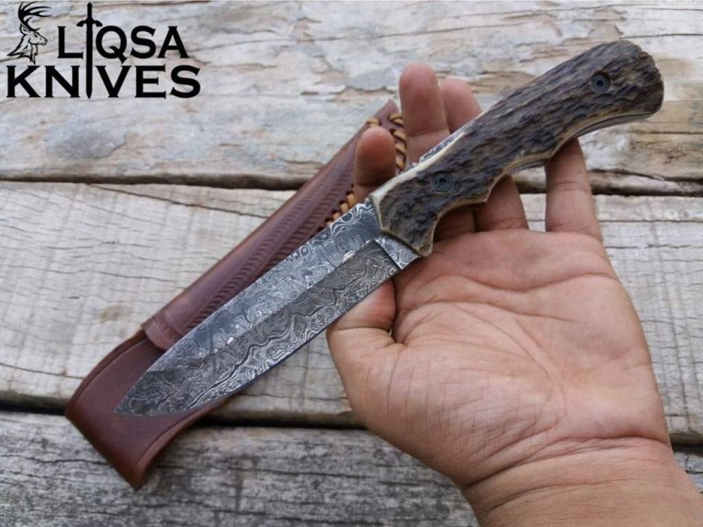 Stag Antler Handle Knife With Damascus Steel Full Tang Blade & Handmade Leather Sheath.