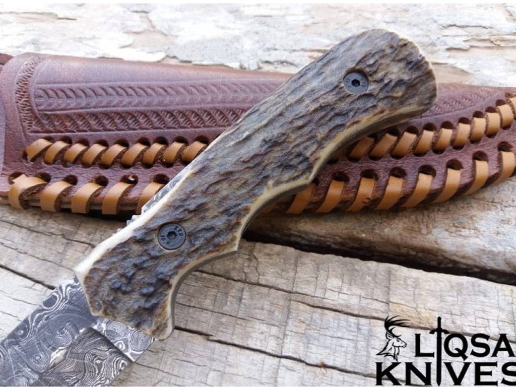 stag antler handle, showcasing its unique texture and comfortable grip.