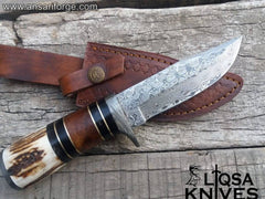 Damascus Hunting Knife with High-Quality Leather Sheath for Protection.
