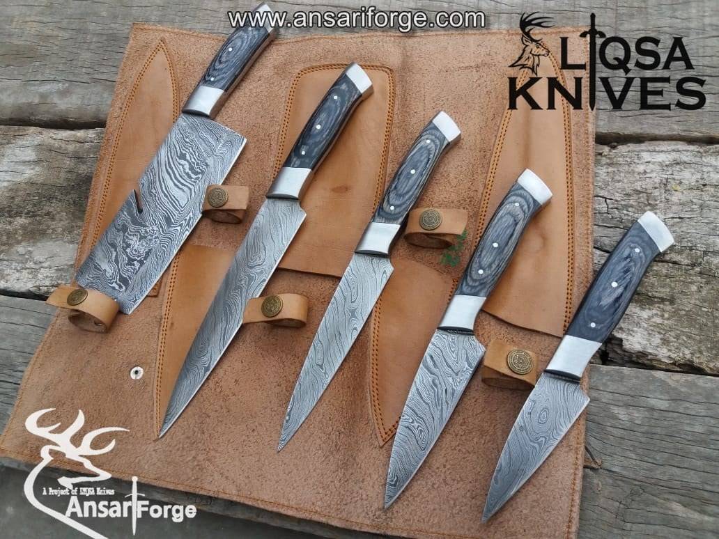 Handmade Damascus kitchen knife set with roll bag.