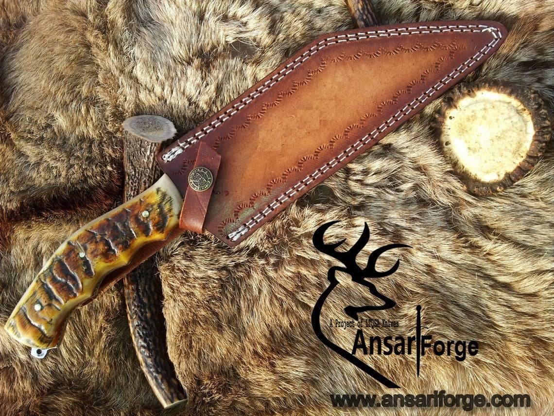 Hand Forged Damascus Seax Knife in brown leather sheath.