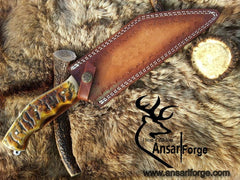 Hand Forged Damascus Seax Knife in brown leather sheath.