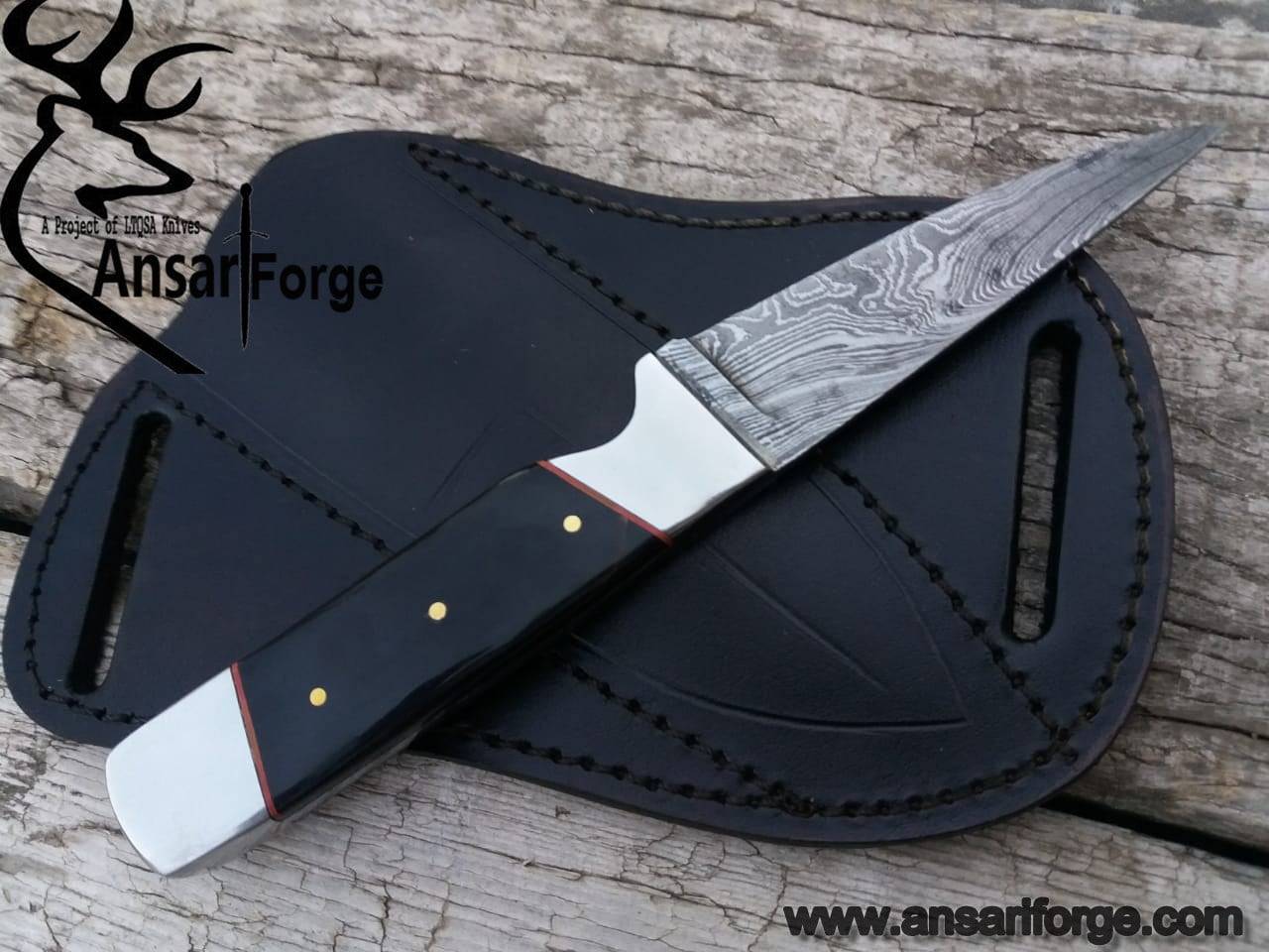 Damascus steel fixed blade skinner with bull horn handle