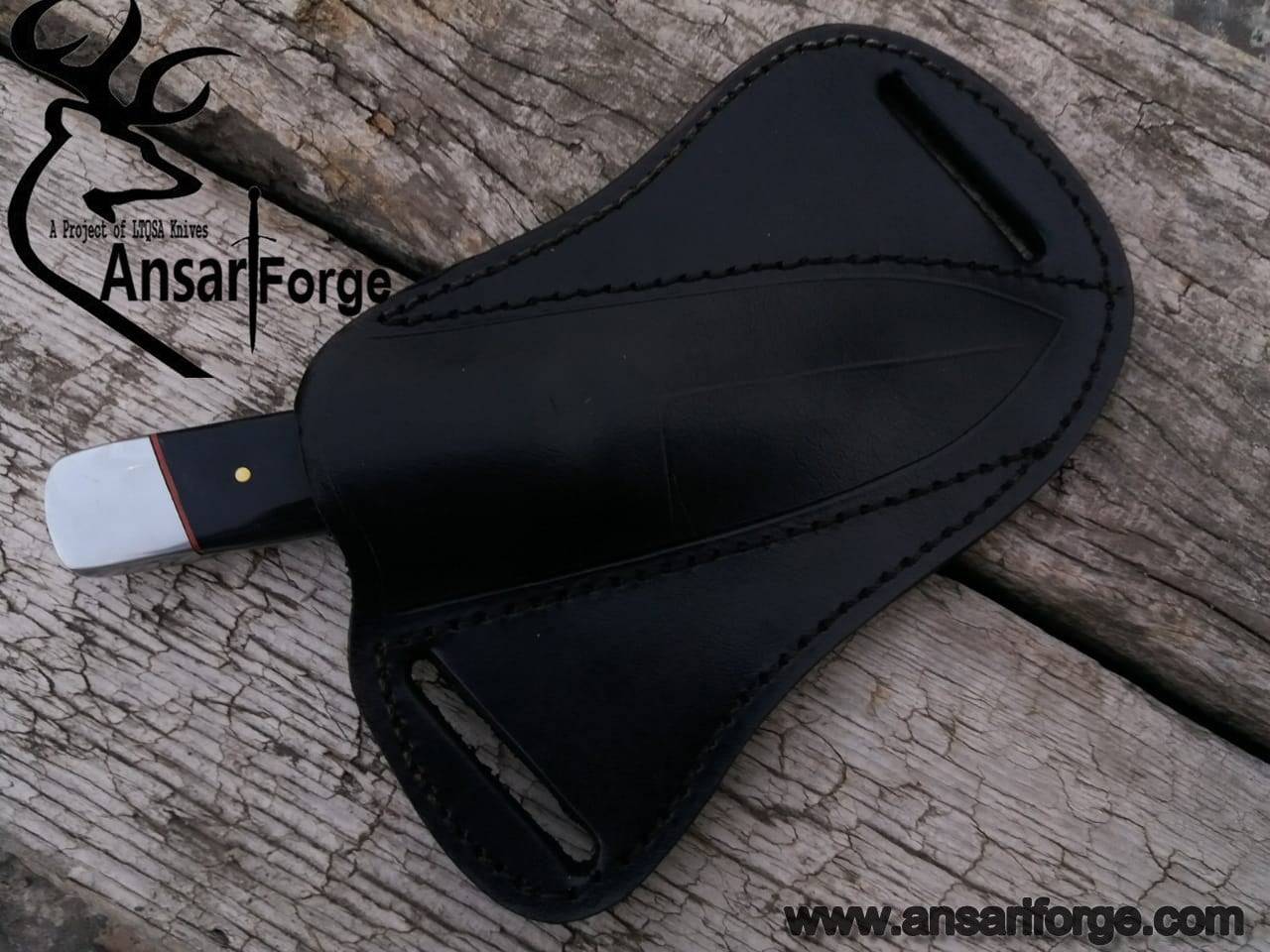 Damascus steel fixed blade skinner with bull horn handle