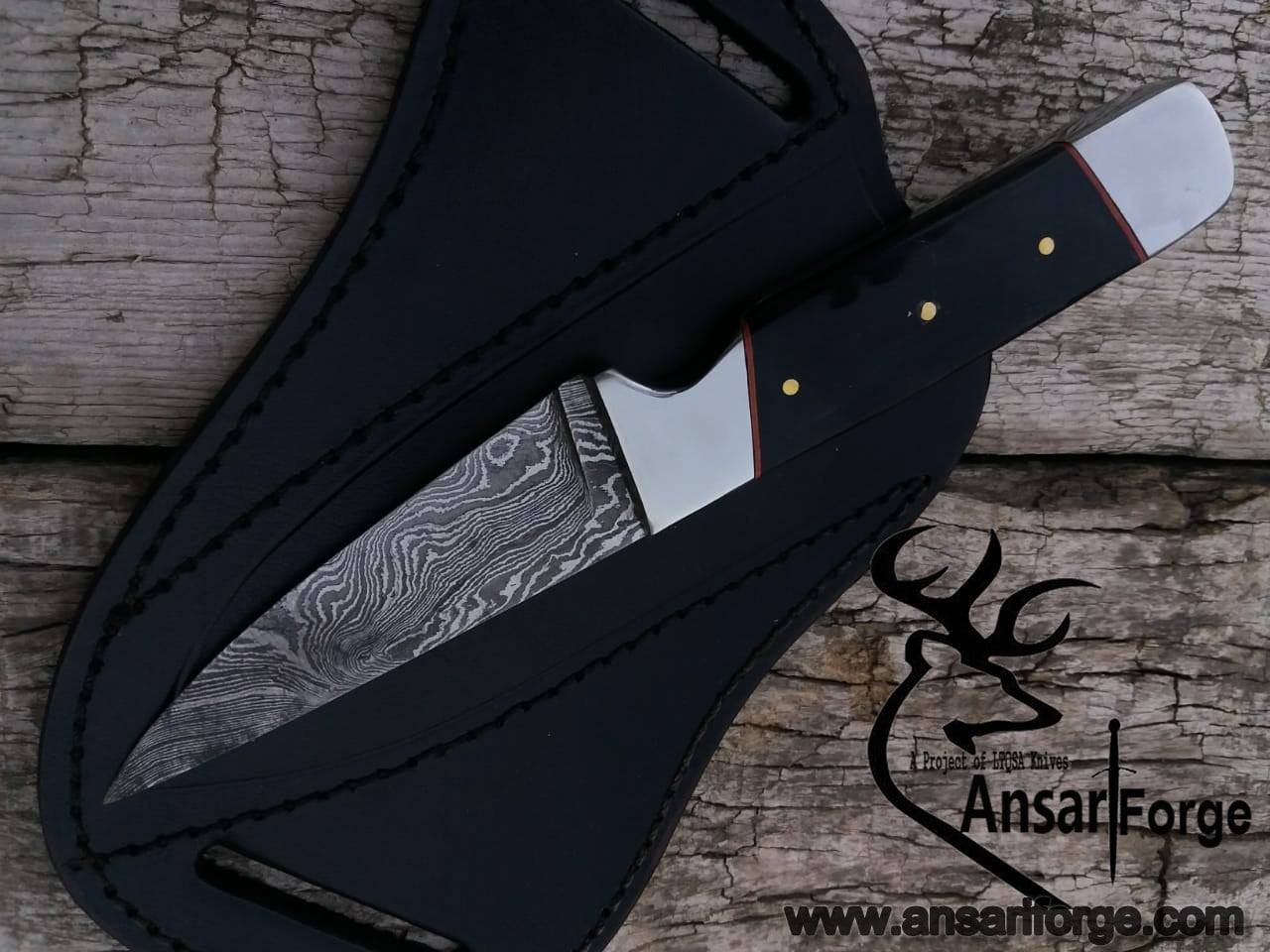 Damascus steel fixed blade skinner with bull horn handle