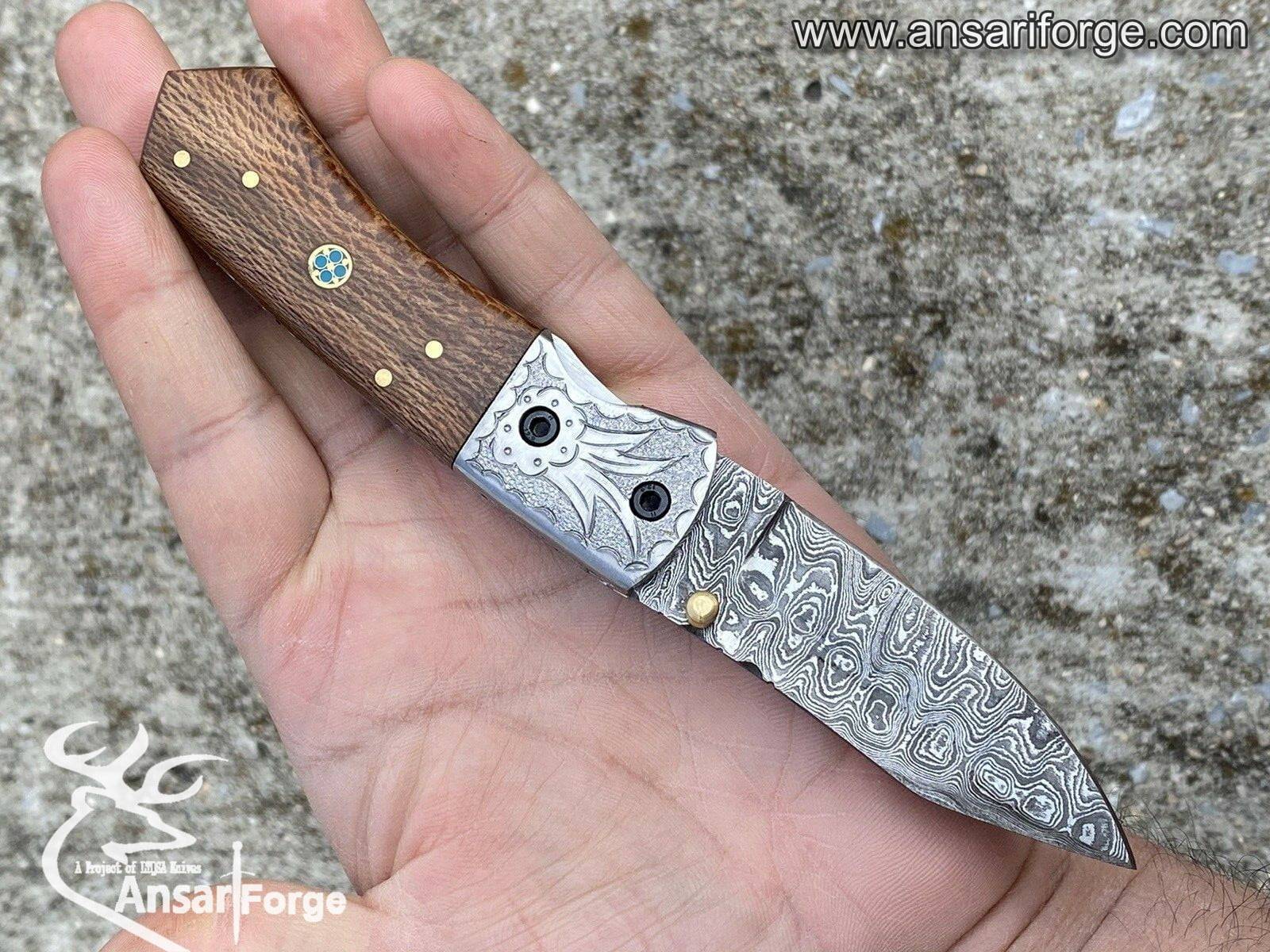 A person using a custom Damascus folding knife to perform a task, highlighting its functionality.